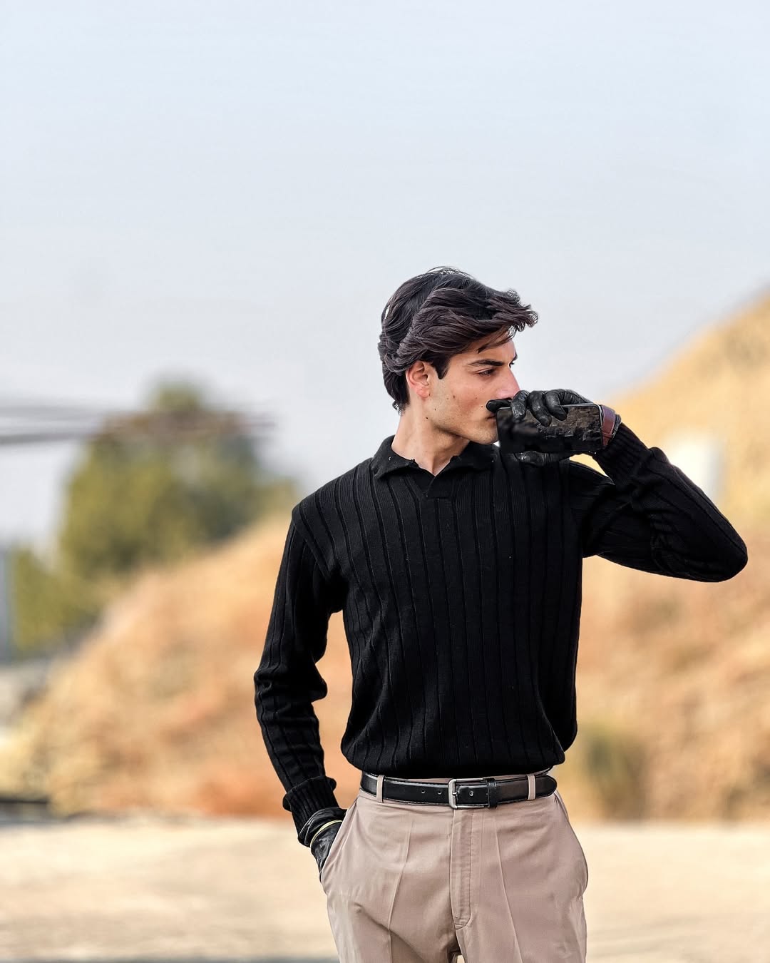 Timeless Black Ribbed Polo Sweater